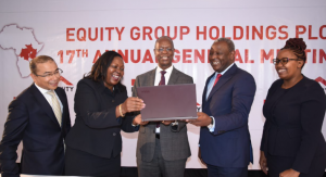  Equity Group Board Chairman, Prof. Isaac Macharia (centre), Group Managing Director and CEO, Dr. James Mwangi (2nd right) and Group Executive Director, Mary Wamae (left) discuss the performance of the Group during this year’s Annual General Meeting. Looking on is Equity Group Director Strategy, Strategic Partnerships and Investor Relations, Brent Malahay (left) and Group Company Secretary, Lydia Ndirangu (right).